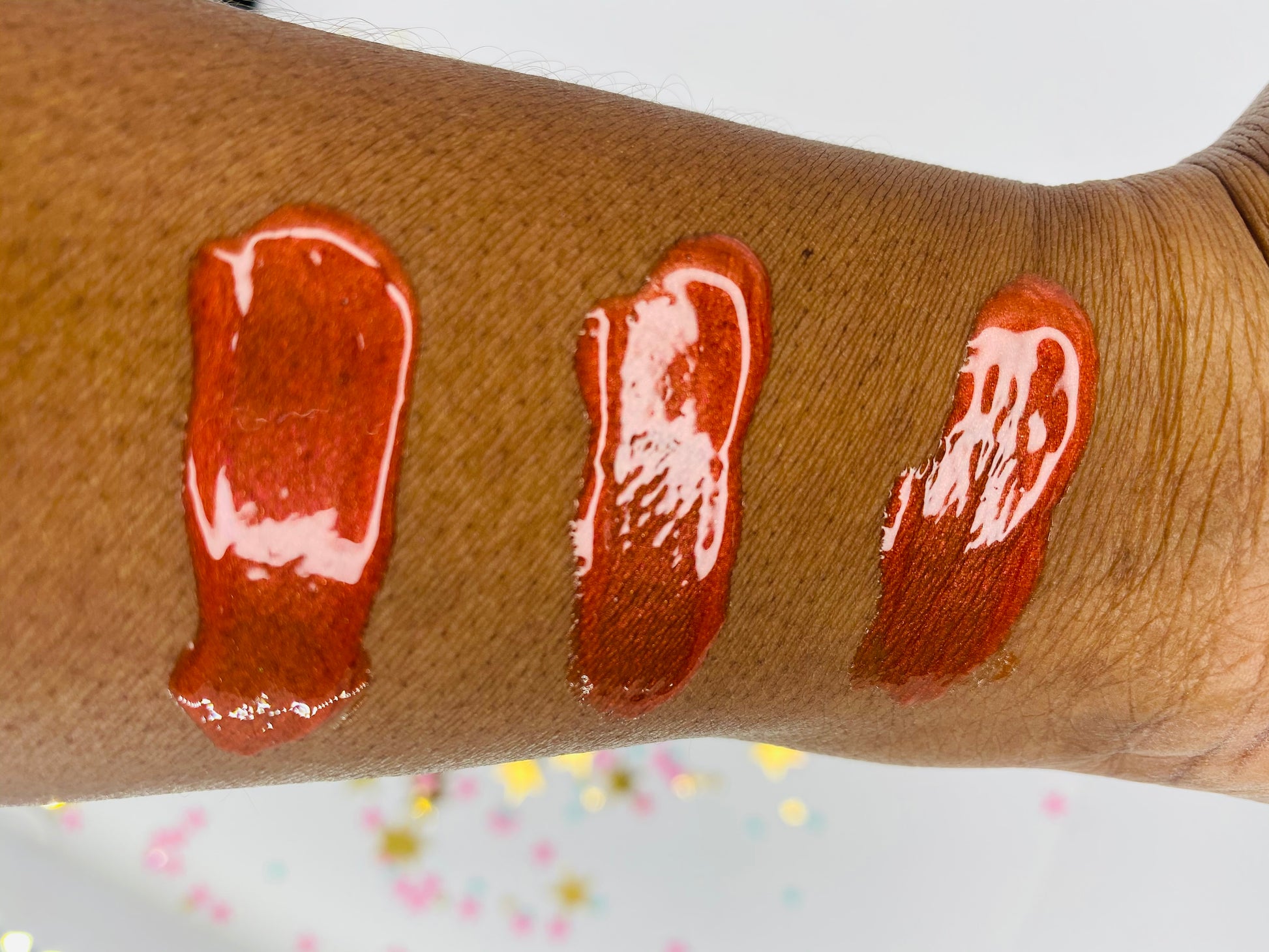 Handcrafted Mango hydrating Lip gloss arm swatches